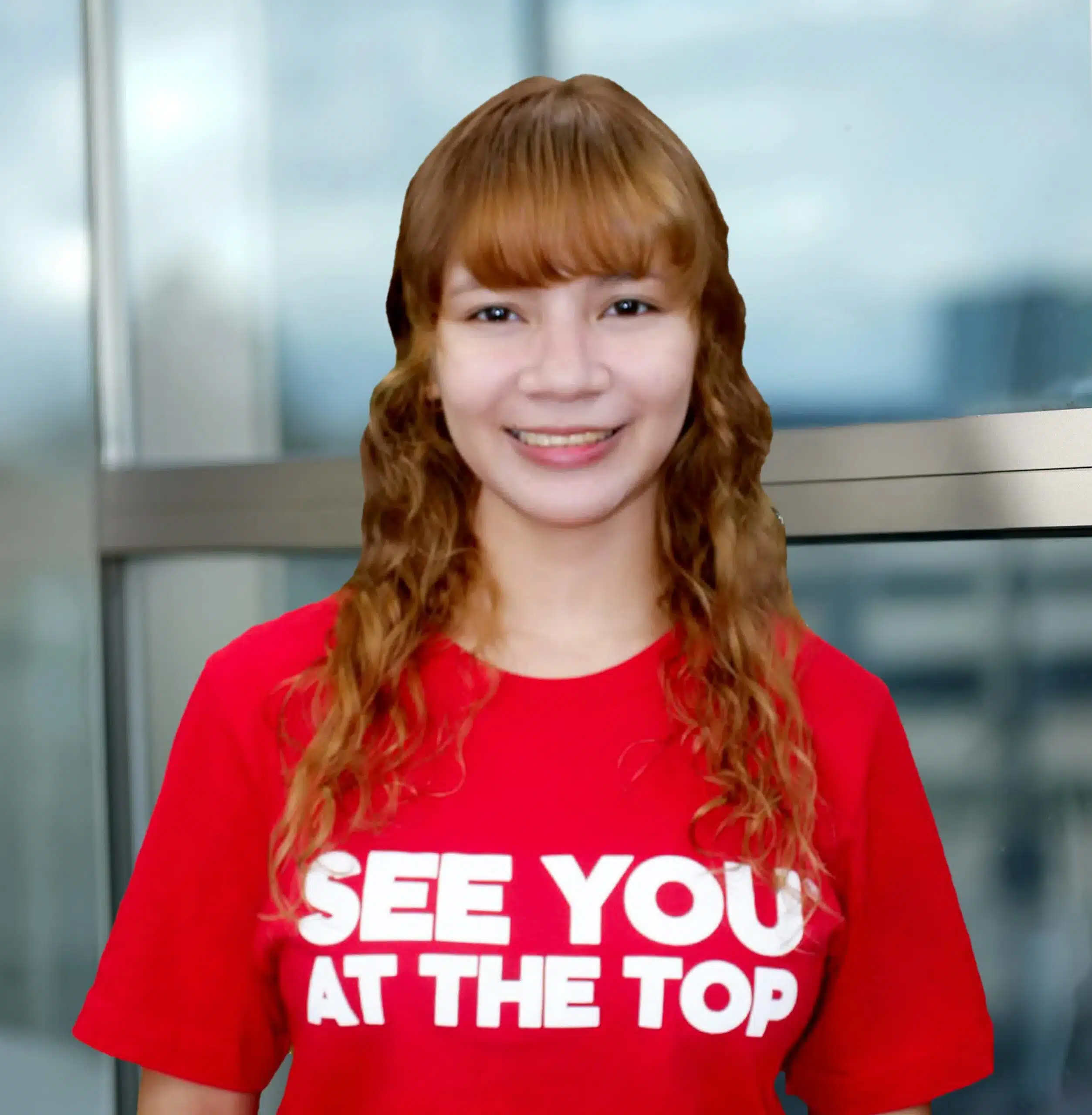Person in red shirt smiling.