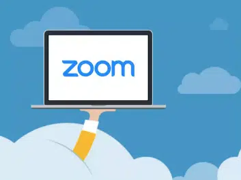 Laptop with Zoom logo in clouds