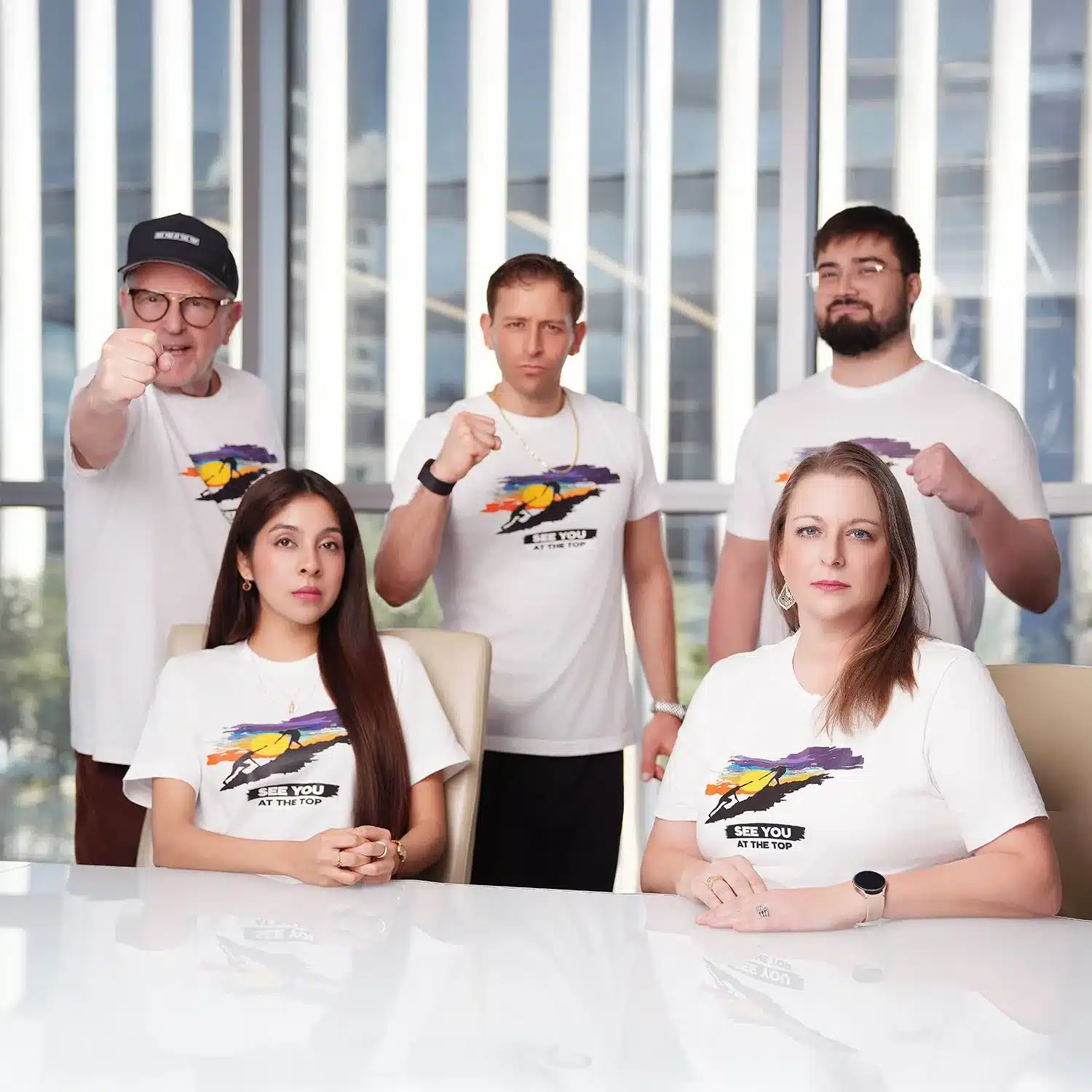 Group of people in matching shirts.